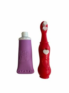 Baby Alive 2-piece set: Pink Spinning Toothbrush & Purple Toothpaste